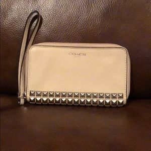 Studded coach wristlet